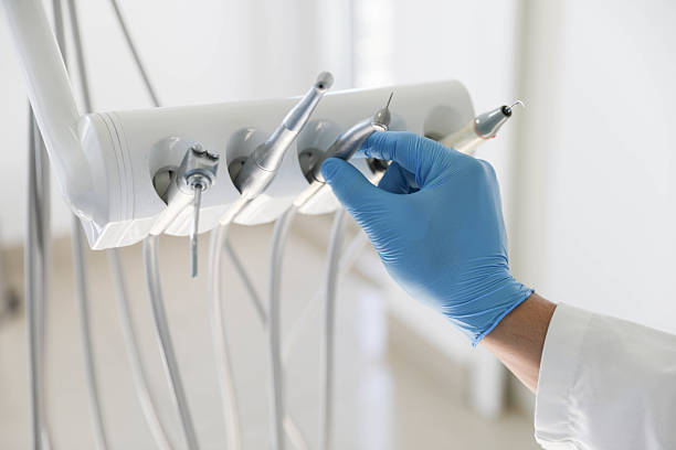 Professional Tooth Extraction technician working in Sandwich, IL
